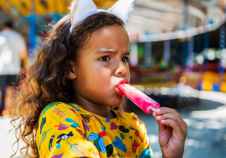 girl eating popscicle